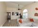 Bright living room featuring vaulted ceilings, modern furnishings, and natural light from a large window at 177 Tracy Ridge Blvd, Whiteland, IN 46184