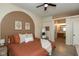 Spacious main bedroom shows an ensuite bath, ceiling fan, and great natural light at 177 Tracy Ridge Blvd, Whiteland, IN 46184