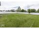 Large backyard with a new white fence at 2006 Creek Bank Dr, Columbus, IN 47201