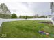 Spacious backyard surrounded by a white fence at 2006 Creek Bank Dr, Columbus, IN 47201