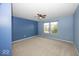 Spacious bedroom with a ceiling fan and bright natural lighting at 2006 Creek Bank Dr, Columbus, IN 47201
