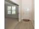 Welcoming foyer featuring wood-look floors and a bright white front door at 2006 Creek Bank Dr, Columbus, IN 47201