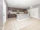 Modern kitchen with a center island, granite countertops, and stainless steel appliances at 2006 Creek Bank Dr, Columbus, IN 47201