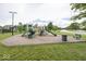 Community playground with multiple slides and climbing structures, perfect for Gathering fun and outdoor activities at 2006 Creek Bank Dr, Columbus, IN 47201