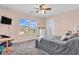 Well-lit bedroom with a large window offering pleasant views, and neutral color scheme at 2261 Shadow Trace Way, Greenwood, IN 46143