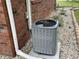 Exterior image of the home's AC unit, neatly placed on a gravel bed with landscaping at 247 N 150 W, Greenfield, IN 46140