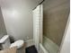 Clean bathroom with a shower/tub combo and tile surround at 247 N 150 W, Greenfield, IN 46140