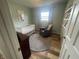Cozy Bedroom featuring hardwood floors, a crib, a comfortable rocking chair at 247 N 150 W, Greenfield, IN 46140