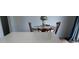 Dining room featuring a flower centerpiece and classic wooden chairs at 247 N 150 W, Greenfield, IN 46140