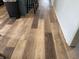 Close-up view of the durable and attractive wood-look flooring in the kitchen area at 247 N 150 W, Greenfield, IN 46140