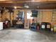 Spacious garage with ample storage space, tools, and concrete flooring at 247 N 150 W, Greenfield, IN 46140