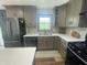 Spacious kitchen featuring sleek, modern appliances and a bright window at 247 N 150 W, Greenfield, IN 46140