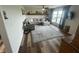 Inviting living room features stylish decor, comfortable seating, and wood-look floors for a cozy atmosphere at 247 N 150 W, Greenfield, IN 46140