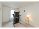 Bright room with a treadmill, carpeted floor, and natural light from the window at 2623 Santaro Ct, Indianapolis, IN 46217