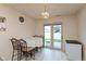 Cozy dining area with a chandelier and sliding glass doors to the outside patio at 2623 Santaro Ct, Indianapolis, IN 46217