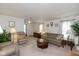 Bright living room featuring plush seating, warm lighting, and an inviting atmosphere at 2623 Santaro Ct, Indianapolis, IN 46217