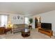 Warm and inviting living room featuring plush sofa, coffee table, and natural light at 2623 Santaro Ct, Indianapolis, IN 46217