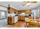 Traditional kitchen with wooden cabinets and updated appliances at 2625 N Boehning St, Indianapolis, IN 46219