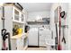 Practical laundry room with storage and essential appliances at 2625 N Boehning St, Indianapolis, IN 46219