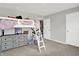 Charming bedroom features a loft bed, neutral walls, plush carpet, and a cozy reading nook at 2972 W Patchwork Dr, Monrovia, IN 46157
