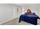 Bedroom with large bed with blue comforter and big stuffed bear at 2972 W Patchwork Dr, Monrovia, IN 46157
