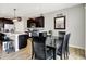 A well-lit dining space near the kitchen with black dining set, perfect for Gathering meals at 2972 W Patchwork Dr, Monrovia, IN 46157