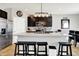 Bright kitchen showcasing stainless steel appliances and a spacious kitchen island with seating at 2972 W Patchwork Dr, Monrovia, IN 46157