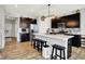Modern kitchen with stainless appliances, black cabinetry, and a center island with seating at 2972 W Patchwork Dr, Monrovia, IN 46157