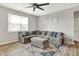 Comfortable living area with a large sectional sofa, area rug, and plenty of natural light at 2972 W Patchwork Dr, Monrovia, IN 46157