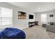 Spacious living room with large windows and entertainment area at 2972 W Patchwork Dr, Monrovia, IN 46157