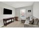 Comfortable living room with a sofa, tv, and a foosball table at 2972 W Patchwork Dr, Monrovia, IN 46157