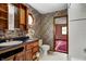 Bathroom featuring a sink, toilet, and window, offering basic functionality and natural light at 305 Cardinal Dr, Whiteland, IN 46184