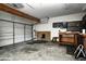 Spacious garage features an automatic door, ample space, workbench and storage at 305 Cardinal Dr, Whiteland, IN 46184