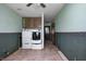 Laundry room features a washer, dryer, and storage cabinets at 305 Cardinal Dr, Whiteland, IN 46184