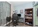 Cozy room with stylish decor, including a book shelf, and comfortable working space at 312 S Center St, Plainfield, IN 46168