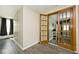 Bright hallway with french doors leading to another room at 312 S Center St, Plainfield, IN 46168