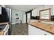 Bright and airy kitchen with butcher block countertops and updated appliances at 312 S Center St, Plainfield, IN 46168