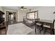 Open-concept living room with hardwood floors, comfortable seating, and ample natural light at 312 S Center St, Plainfield, IN 46168
