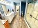 Bathroom with double vanity, walk-in shower, and neutral decor at 4223 Kestrel Ct, Indianapolis, IN 46254