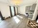 Versatile flex room with ample natural light, modern flooring, and stylish grey built-ins at 4223 Kestrel Ct, Indianapolis, IN 46254