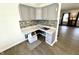 Functional flex room with grey built-in cabinets, ideal for a home office or hobbies at 4223 Kestrel Ct, Indianapolis, IN 46254