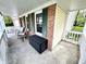 Charming front porch featuring comfortable seating and decorative features, perfect for relaxing outdoors at 4223 Kestrel Ct, Indianapolis, IN 46254