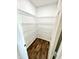 Pantry with wire shelving and wood-look flooring at 4223 Kestrel Ct, Indianapolis, IN 46254