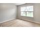A bright bedroom with large window and neutral colors awaiting your personal touch at 4303 Cowslip Ct, Indianapolis, IN 46203