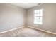 Simple bedroom with natural light and neutral walls, ready for personalization at 4303 Cowslip Ct, Indianapolis, IN 46203