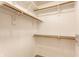 Walk-in closet with ample shelving and storage space ready to be organized at 4303 Cowslip Ct, Indianapolis, IN 46203