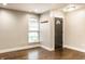 Entryway features wood-look floors, a window for natural light, and access to other rooms at 4303 Cowslip Ct, Indianapolis, IN 46203