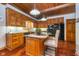 Well-equipped kitchen featuring granite countertops, island, and stainless steel appliances at 4401 W Hunters Ridge W Ln, Greenwood, IN 46143