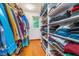 Walk-in closet with custom built-in shelving and storage space at 4401 W Hunters Ridge W Ln, Greenwood, IN 46143