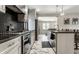 Well-equipped kitchen featuring modern appliances, sleek countertops, and ample cabinet space, designed for culinary enthusiasts at 5124 N Capitol Ave, Indianapolis, IN 46208